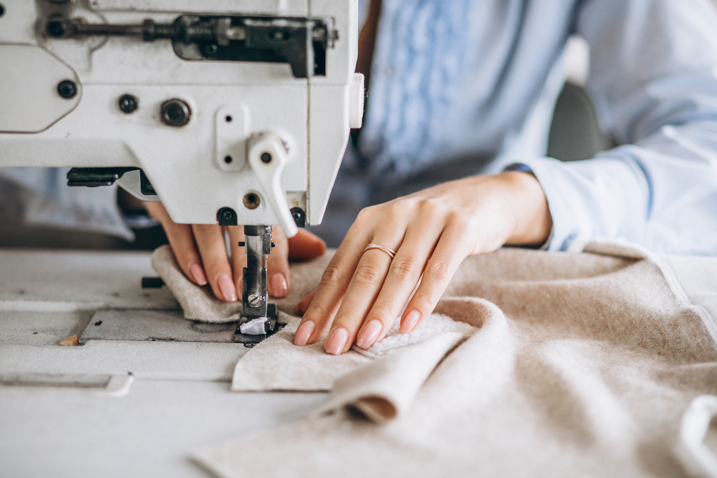 Expert tailor working in KBK Exports garment manufacturing facility, Jaipur India